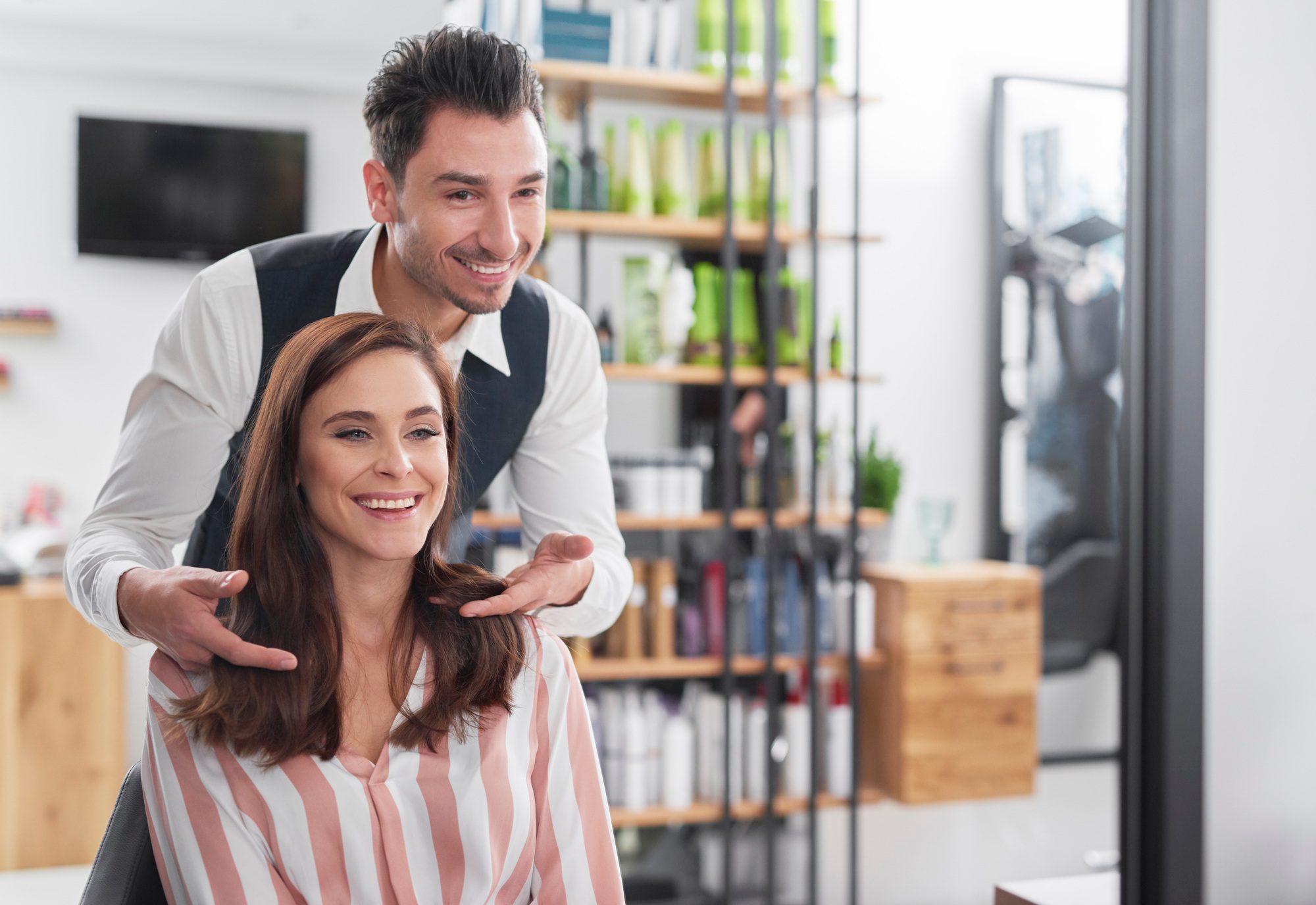 Hairstylist And Female Customer In Hair Salon.jpg
