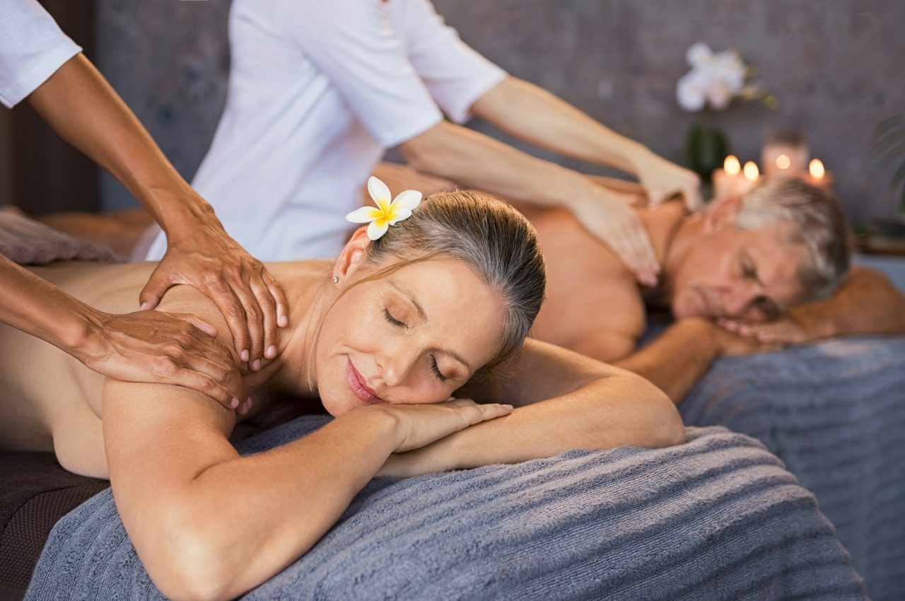 Mature Couple Having Massage At Spa.jpg