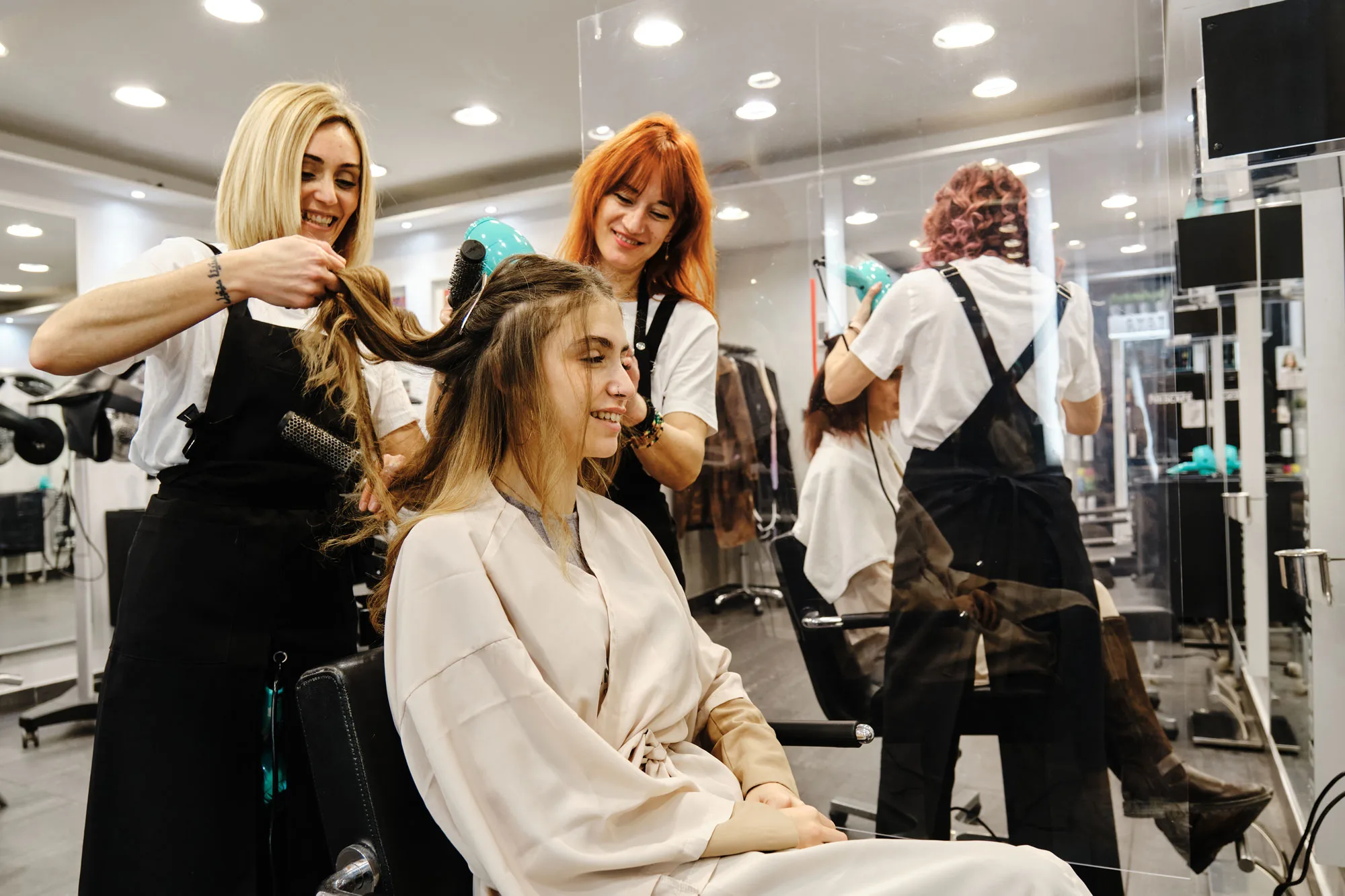 Professional Stylists Combing A Young Woman Hair I 2023 11 27 05 29 53 Utc2.webp